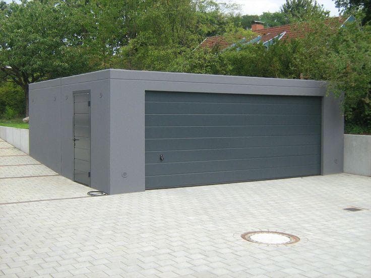 Modern detached garage and residential approach